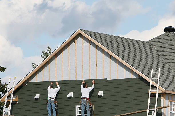 Professional Siding Installation technician working in Harrellsville, NC